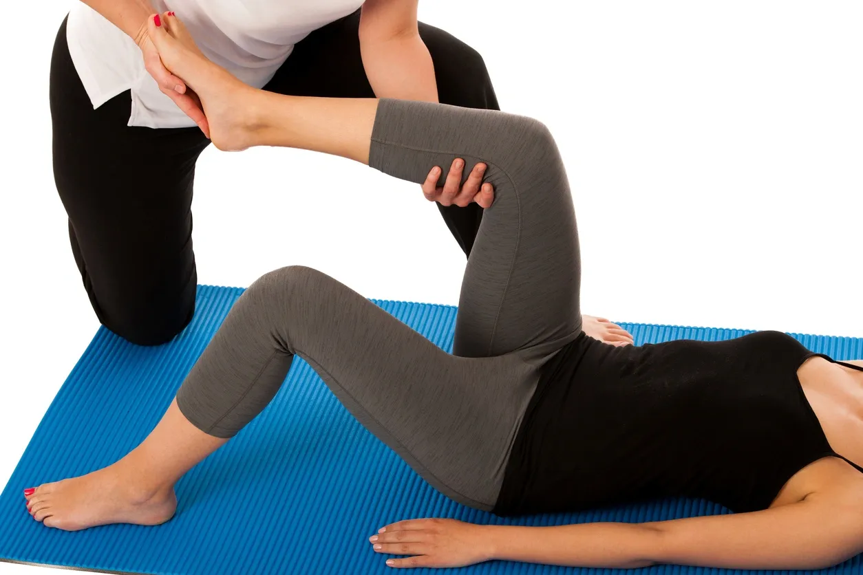 A person is doing yoga on the ground